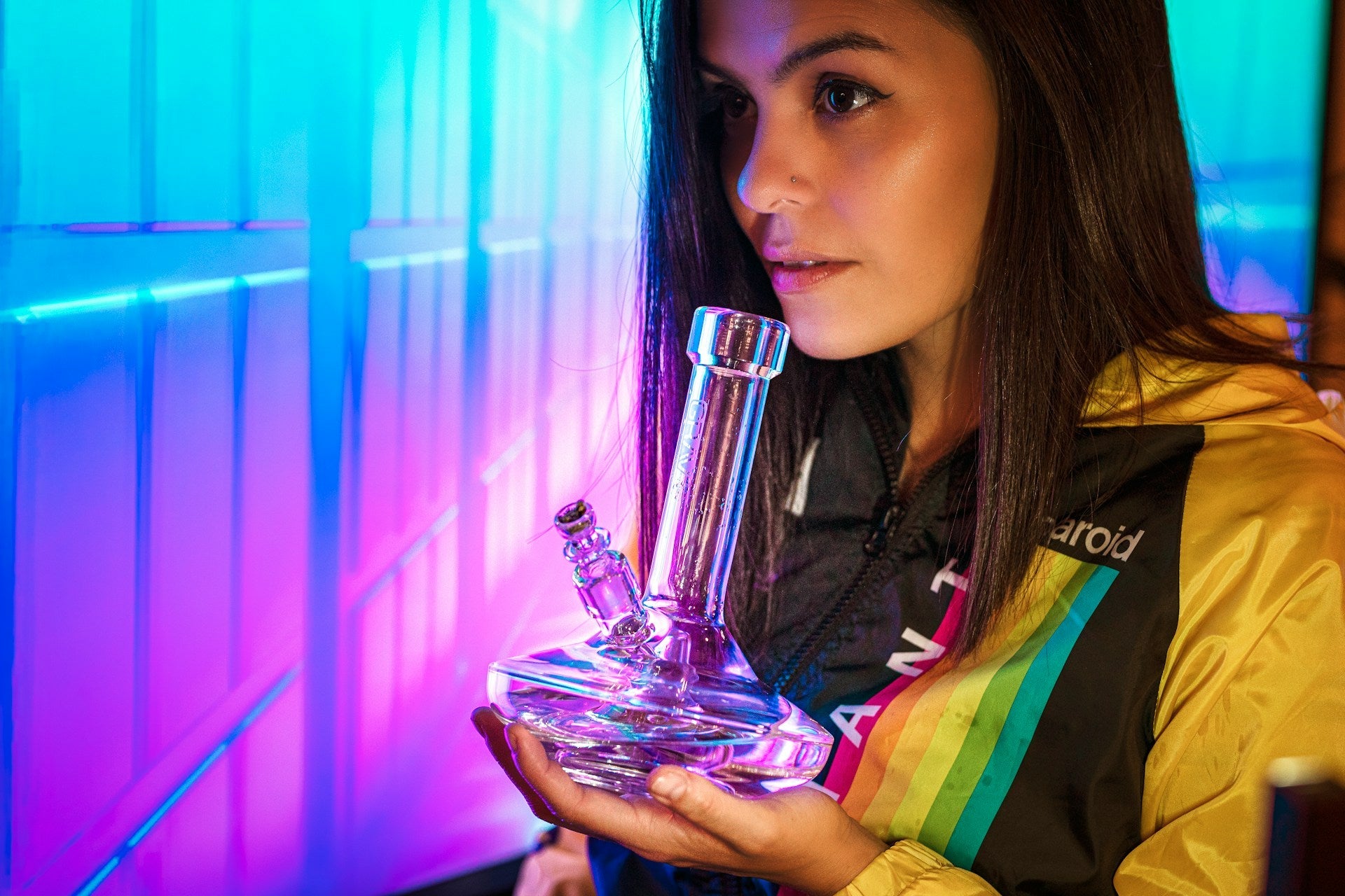 girl holding a thick bong