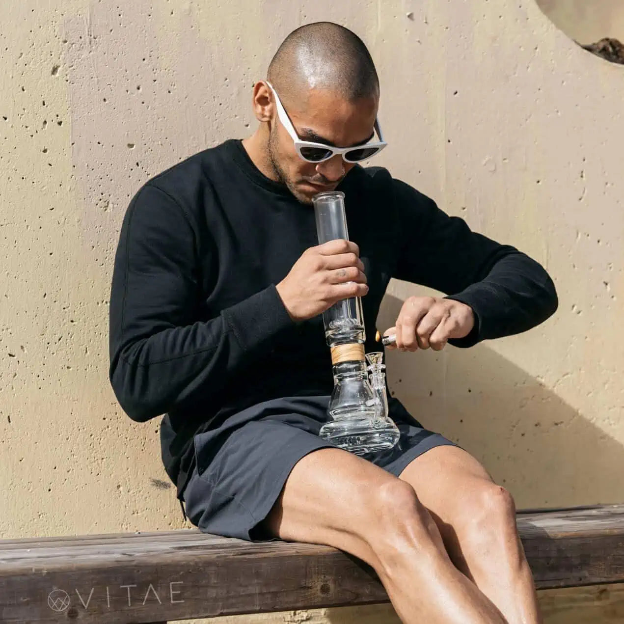 man getting higher with bong